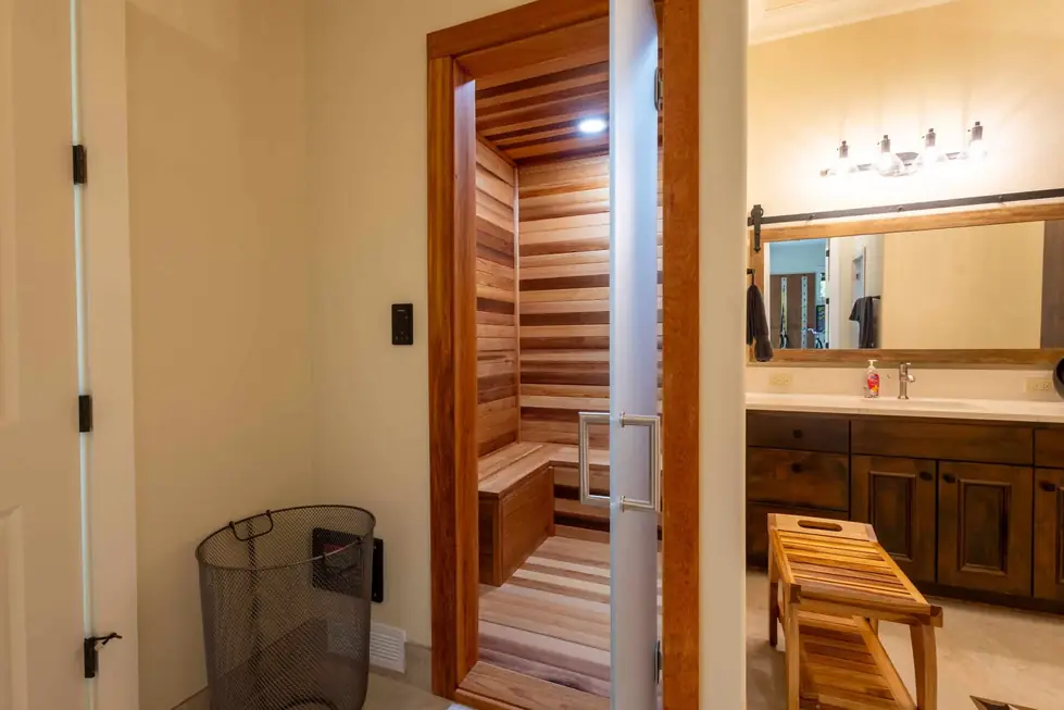 A cedar sauna off a master bath