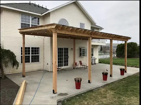 A finished pergola built by Fisher Construction